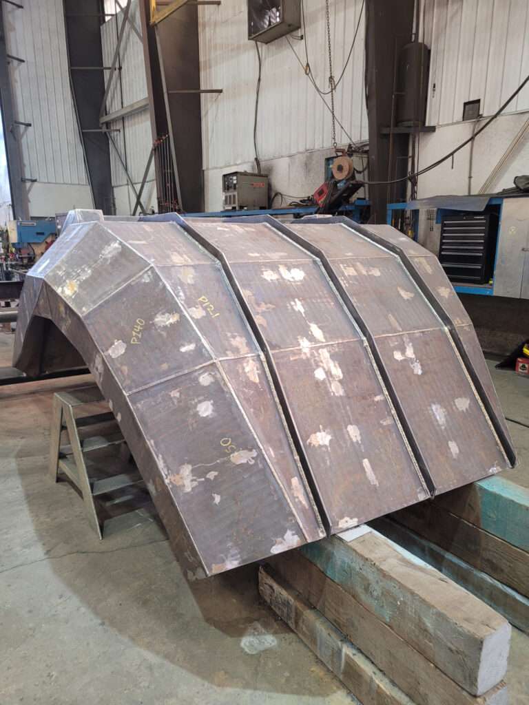 Completed Tripper Deflector Spoon in fabrication shop